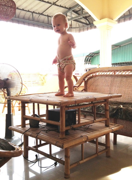 Aya climbing the porch table for a dance