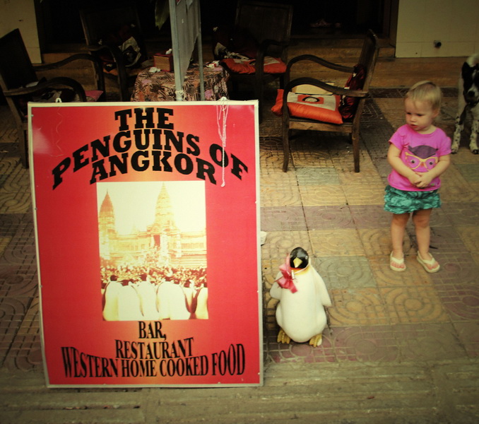 Penguins of Angkor After a trip to Mondulkiri last year, we heard that the infamous Banana's Restaurant shut down. It's colourful owner moved to Kampong Cham to start fresh. Apparently tourists that just came from Angkor Wat are so stupid that when you ask them if they saw penguins during their visit, they respond in all seriousness that they must have missed them this time. Aside from great conversation like this, the Europian home-cooked food can't be beat!